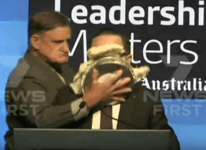 VIDEO: Qantas CEO hit with pie in the face during speech | Secret Flying