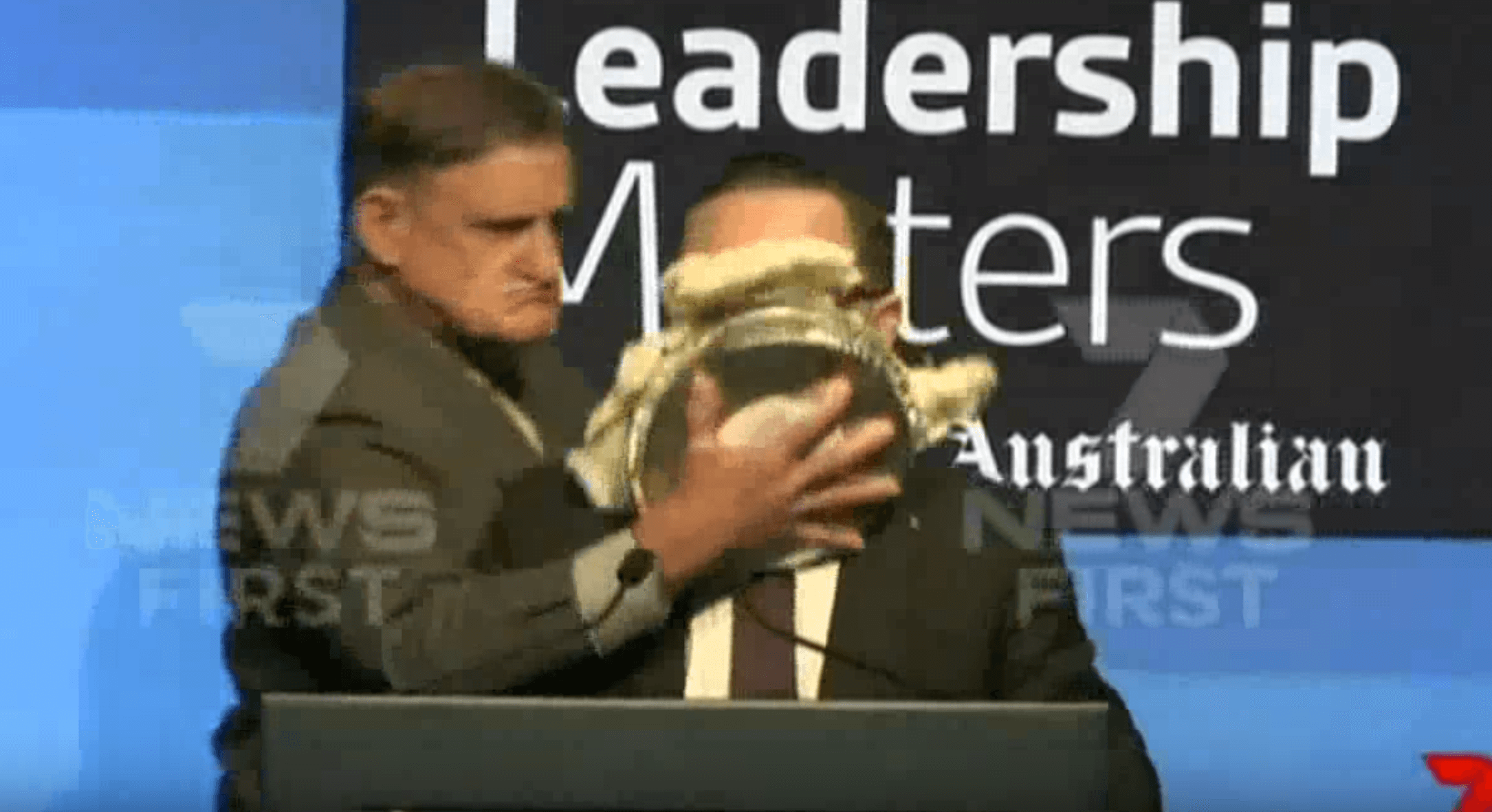 VIDEO: Qantas CEO hit with pie in the face during speech