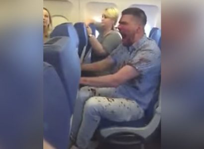 VIDEO: Bloodied Russian passenger restrained after drunken disturbance | Secret Flying