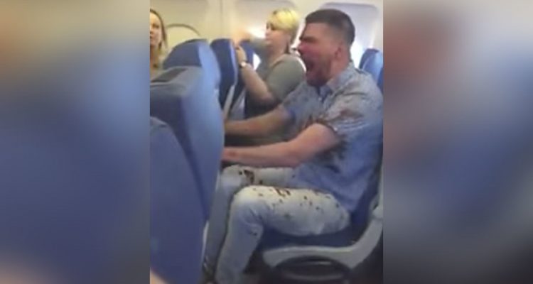 VIDEO: Bloodied Russian passenger restrained after drunken disturbance | Secret Flying