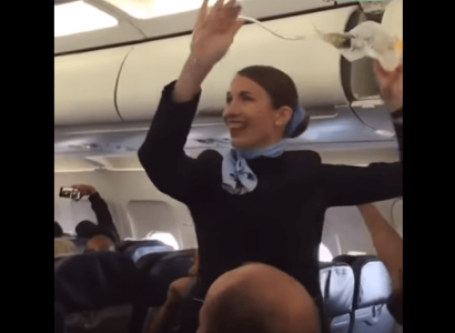 VIDEO: Flight attendant wolf-whistled by cheering French football fans during safety routine | Secret Flying
