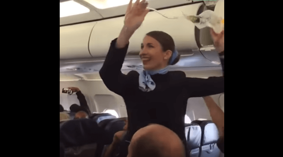 VIDEO: Flight attendant wolf-whistled by cheering French football fans during safety routine