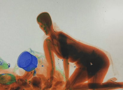 VIDEO: Chinese woman climbs through X-ray machine to ensure her handbag isn’t stolen | Secret Flying