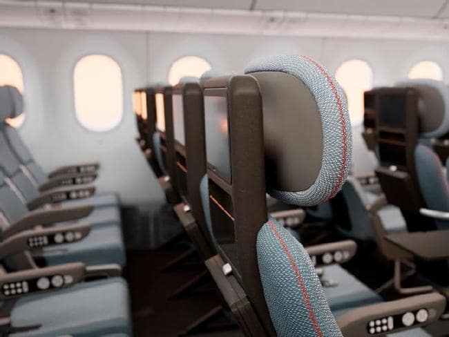 New economy airline seat aimed at making flying bearable for tall people