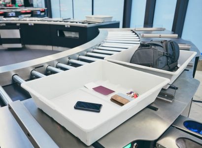 Airport security trays carry more germs than the toilets | Secret Flying