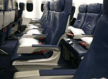 Man sues American Airlines claiming his finger was caught in armrest for duration of flight | Secret Flying