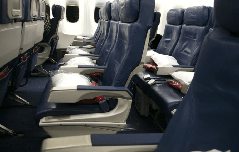Man sues American Airlines claiming his finger was caught in armrest for duration of flight