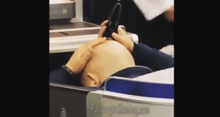 VIDEO: United Airlines passenger shamed for shaving his head in his seat | Secret Flying