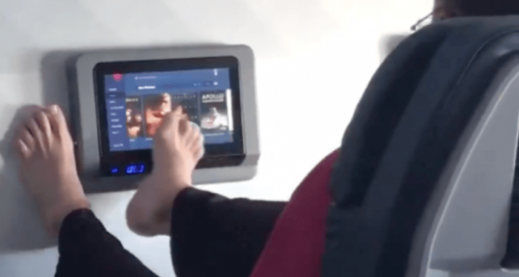 VIDEO: Disgust as airline passenger uses bare feet to swipe touch-screen TV | Secret Flying VIDEO: Disgust as airline passenger uses bare feet to swipe touch-screen TV | Secret Flying