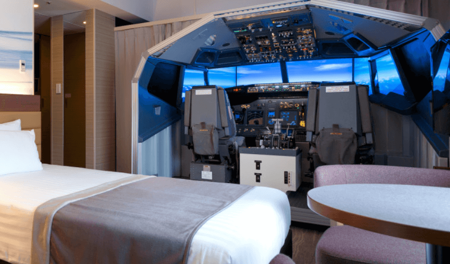 Japanese airport hotel puts lifesize flight simulator in room
