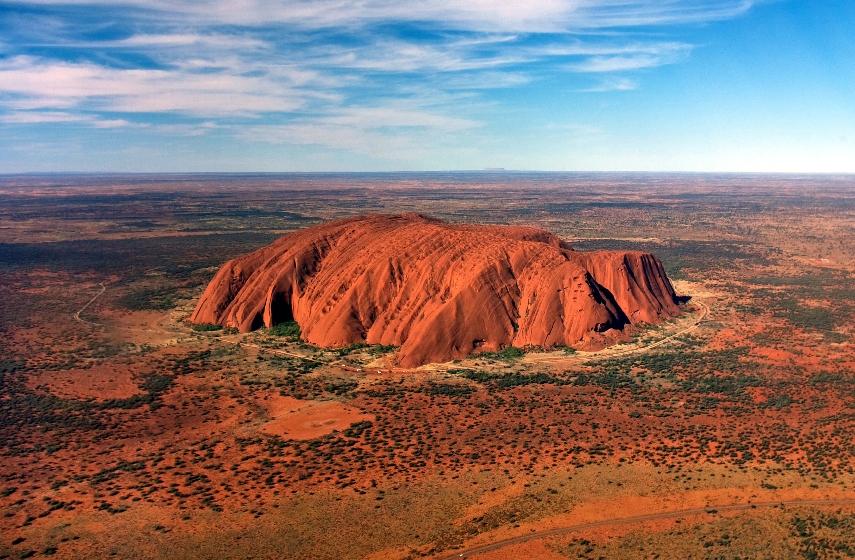 Tourists climb Uluru for the final time before permanent closure