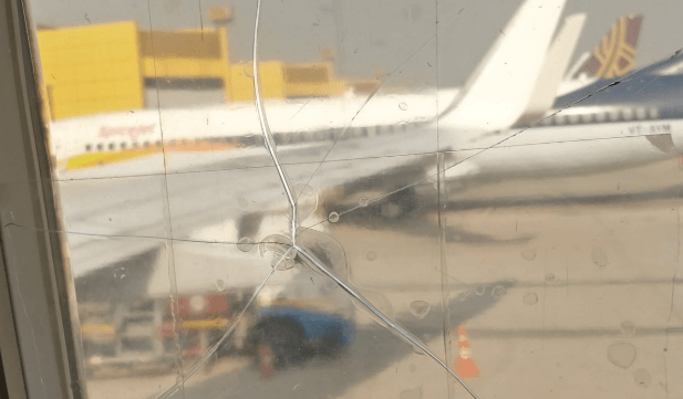 Shock as Indian airline simply tapes up a cracked window | Secret Flying