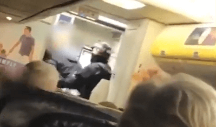 Ryanair passenger arrested after headbutting cabin crew over facemask
