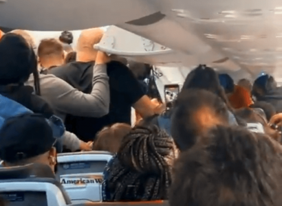 VIDEO: American Airlines passengers fight over who gets off plane first | Secret Flying