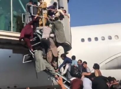 VIDEO: Chaos at Kabul Airport as Afghans climb on planes in attempt to flee the country | Secret Flying