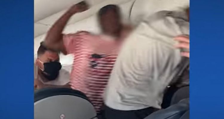 VIDEO: American Airlines passengers brawl over a reclined seat that got stuck | Secret Flying