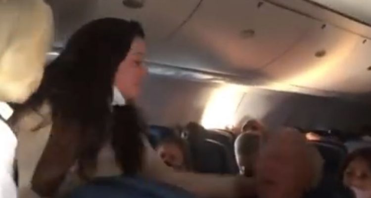 VIDEO: Former NFL cheerleader arrested on Delta flight after punching and spitting on man over facemask | Secret Flying