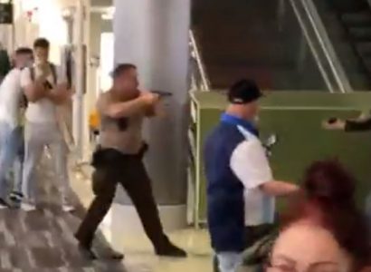 VIDEO: Shocking scenes at Miami Airport as officer brawls with passengers and pulls out gun | Secret Flying