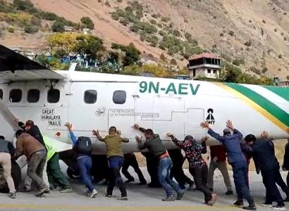 VIDEO: Passengers in Nepal push plane down runway after tire burst | Secret Flying
