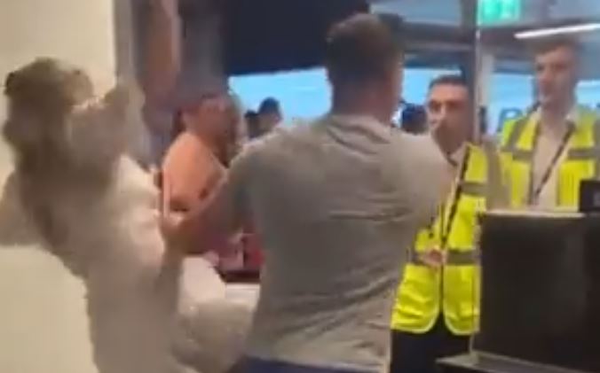 VIDEO: Drunk easyJet flier shoves girlfriend to punch airport worker