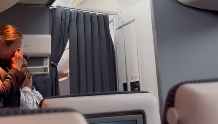 VIDEO: British Airways flight attendants left in tears when pilot announces Quee..