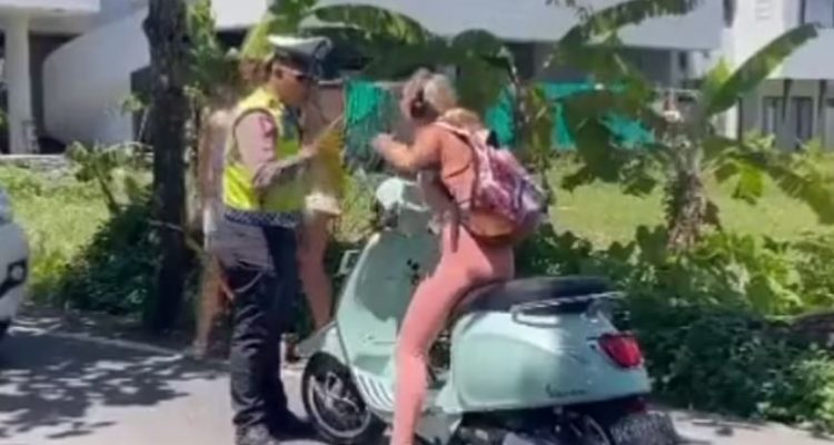 VIDEO: Aussie woman deported from Bali after clash with police for not wearing motorcycle helmet | Secret Flying