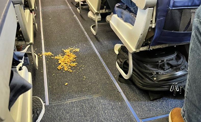 Southwest flight attendant refuses to let plane take off until passengers pick up rice off the floor