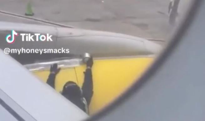 Video of Spirit Airlines worker putting tape on plane before takeoff goes viral | Secret Flying