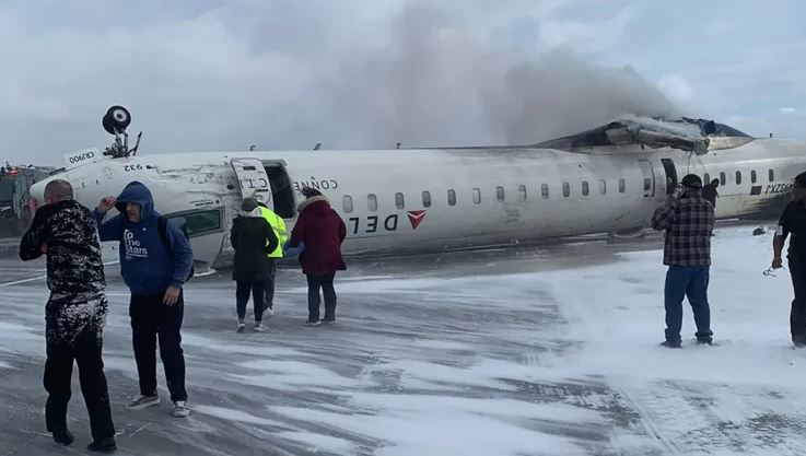 Delta offers $30,000 to passengers on crashed overturned plane